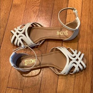 White closed-toe flat strappy sandals